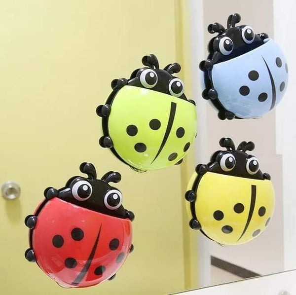 Lady bug brush holder
