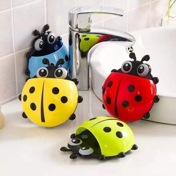Lady bug brush holder