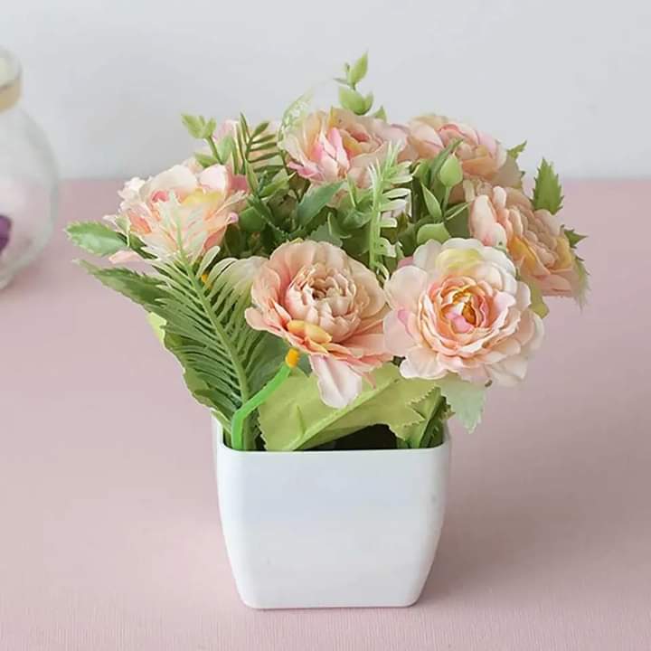 Beautiful flower pot with flower arrangement