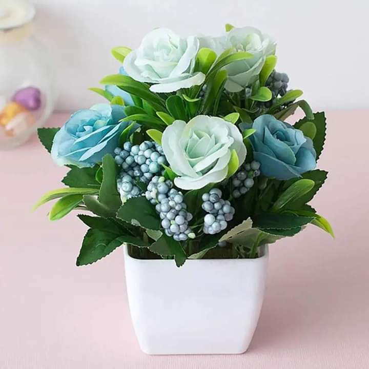 Beautiful flower pot with flower arrangement