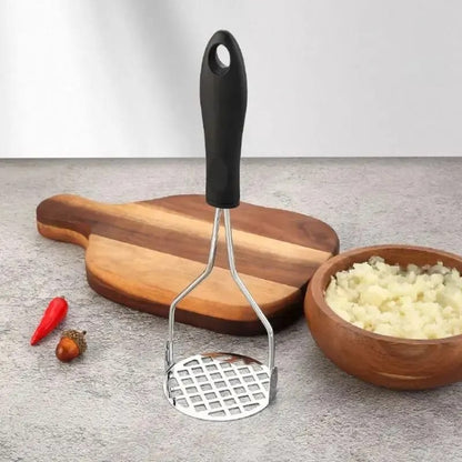 Manual potatoes and garlic masher