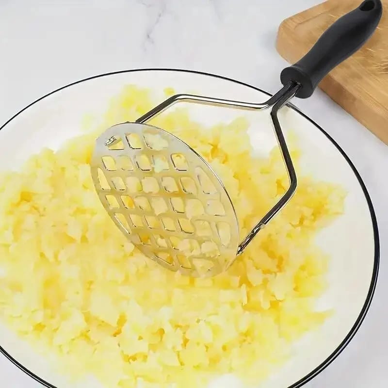 Manual potatoes and garlic masher