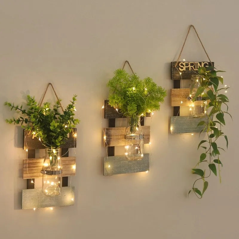 Led glass jar with flower arrangement in beautiful look wooden hanging.